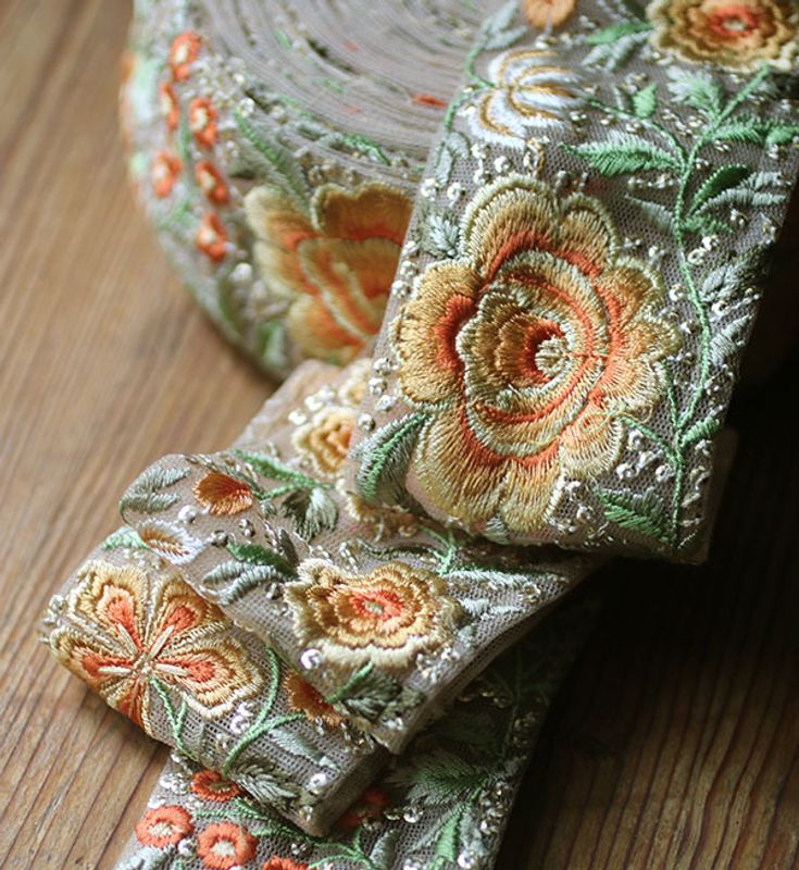 Dekorband - organza med gula blommor