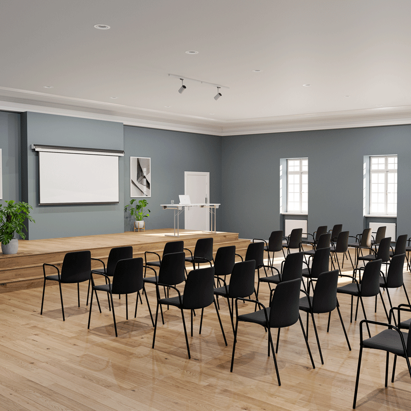 Tygklädd stapelbar stol med armstöd - Choice