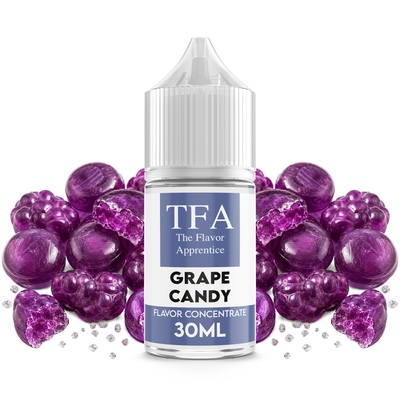 Flaska med Grape Candy från The Flavor Apprentice framför lila vindruvsgodis.