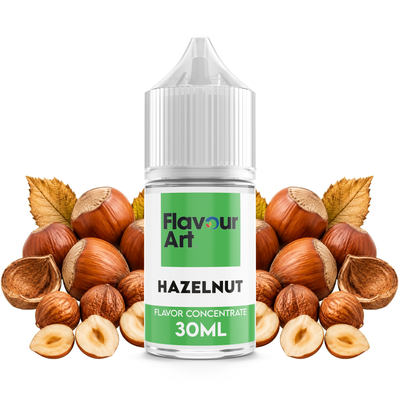 Flaska med Hazelnut från Flavour Art framför rostade hasselnötter.