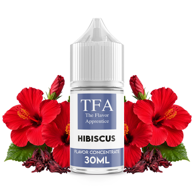 Flaska med Hibiscus från The Flavor Apprentice framför röda hibiskusblommor.