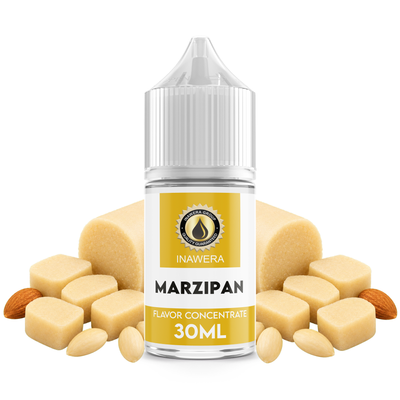 Flaska med Marzipan från Inawera framför bitar av marsipan och mandlar.
