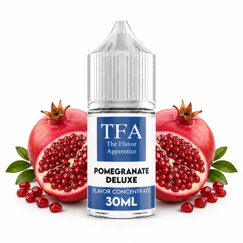 Pomegranate Deluxe The Flavor Apprentice Flaska framför granatäpple mot en vit bakgrund
