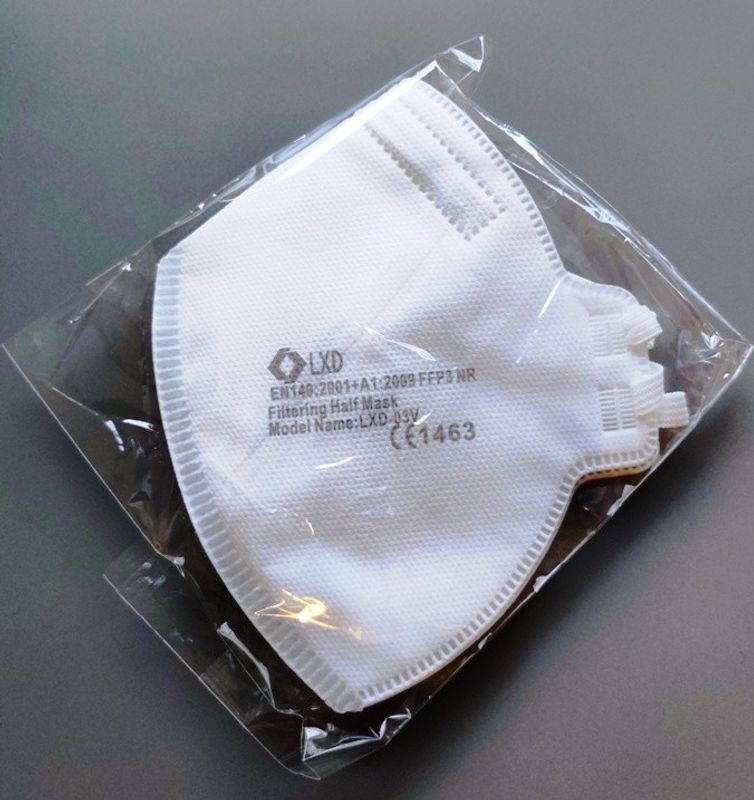 FFP3 skyddsmask med ventil som skyddar mot Coronavirus i Lager