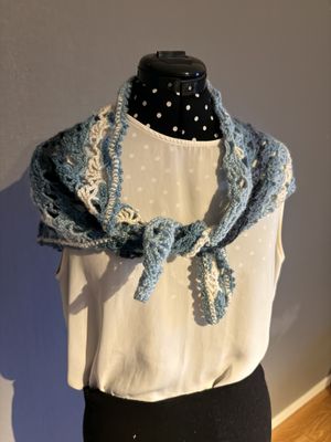 Sjal i snäckskals mönster