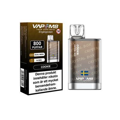 VapeM8 Crystal Box Dual Mesh Engångs Vape Cookie engångsvape bredvid originalförpackning mot vit bakgrund.