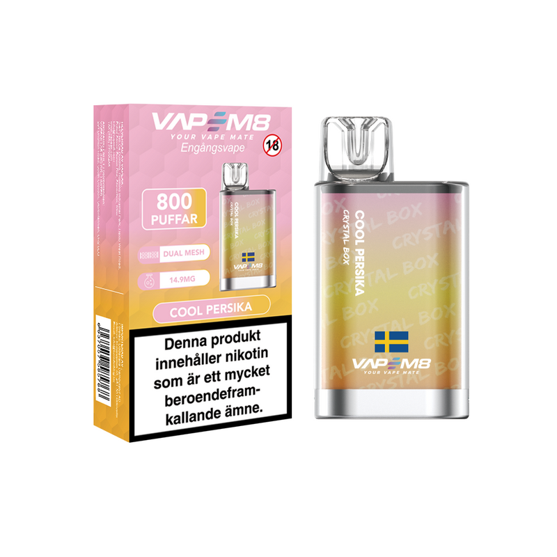 VapeM8 Crystal Box Dual Mesh Engångs Vape Cool Persika engångsvape bredvid originalförpackning mot vit bakgrund