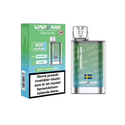 VapeM8 Crystal Box Dual Mesh Engångs Vape Mint Tuggummi engångsvape bredvid originalförpackning mot vit bakgrund
