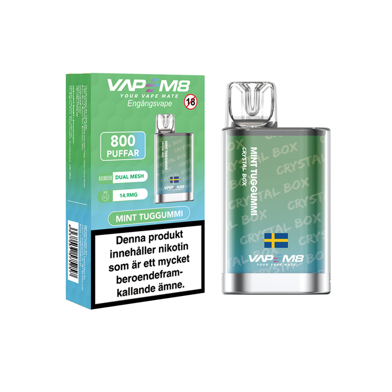 VapeM8 Crystal Box Dual Mesh Engångs Vape Mint Tuggummi engångsvape bredvid originalförpackning mot vit bakgrund