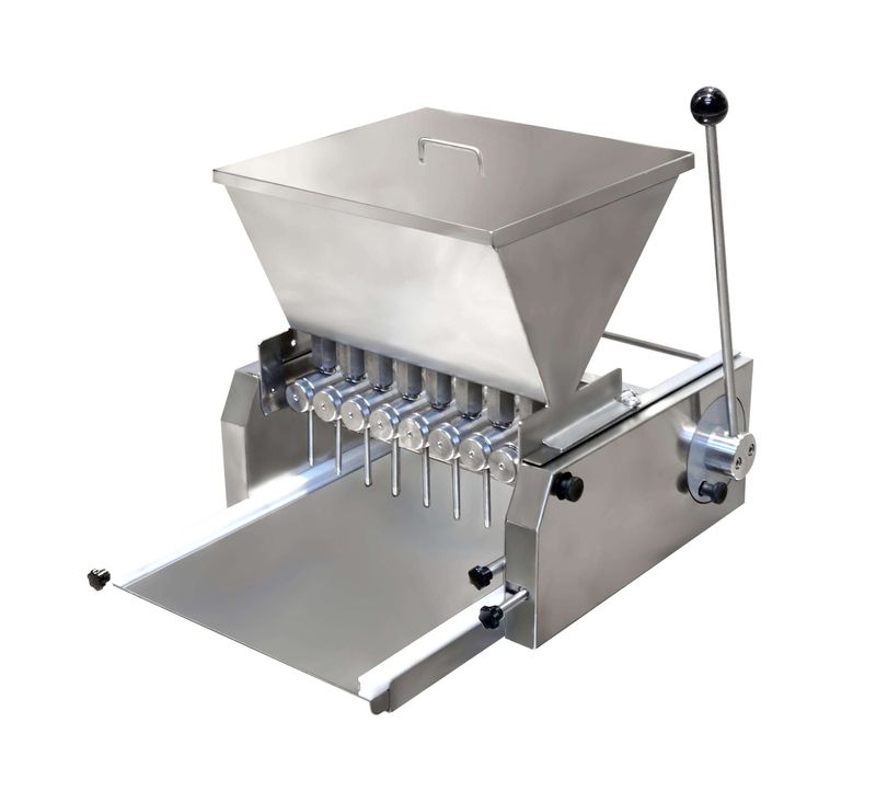 Fyllningsmaskin för praliner