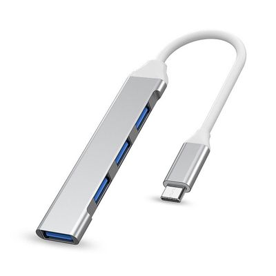 USB-C till 4-port USB 3.0 hub i elegant aluminiumdesign, perfekt för snabb dataöverföring och utökade anslutningsmöjligheter.