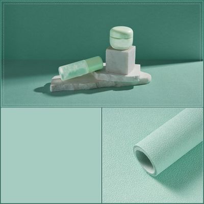 Mintgrön bakgrund med struktur för produktfoto Liten