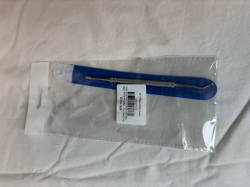 Dubbelsidigt nagelverktyg i rostfritt stål