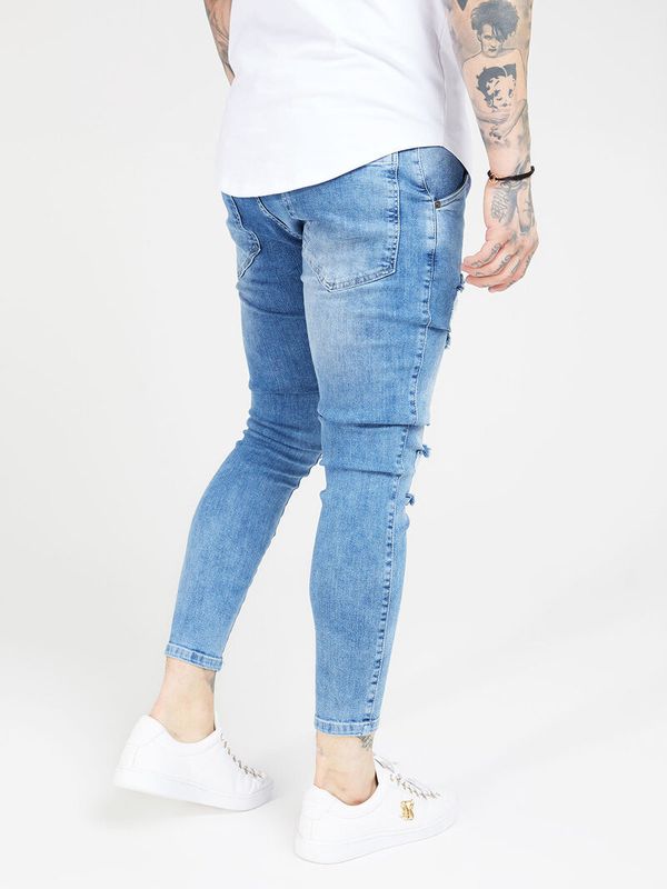 Distressed Skinny Jeans Mid Wash