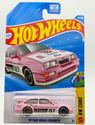 Ford Sierra Cosworth 1987 rosa - Hot Wheels 1:64 (skadad förpackning)