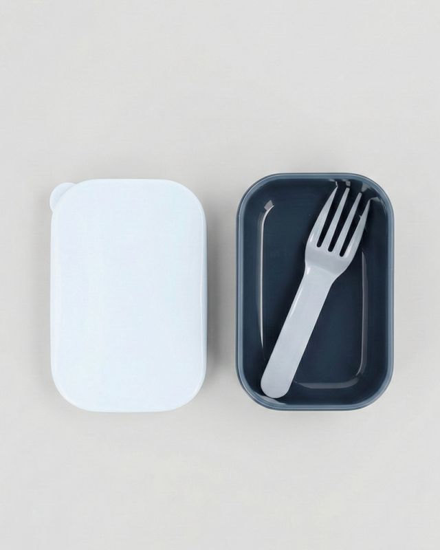 Blå fruktlåda med gaffel