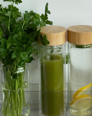 Glasflaska med teinsats