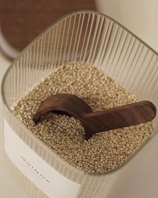 Träsked i valnöt 9.5 cm