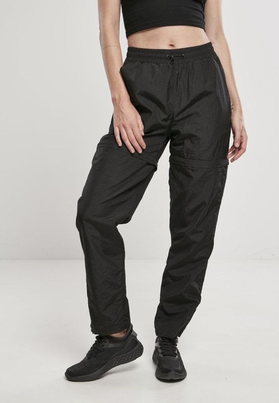 Black shimmering long pants and pirate pants lady