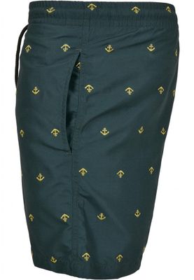 Dark green swimming shorts with golden anchors