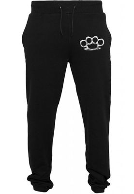 Jogging pants with brass knuckles
