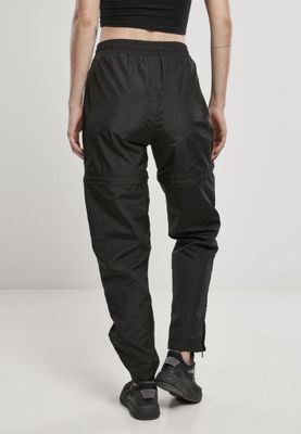 Black shimmering long pants and pirate pants lady