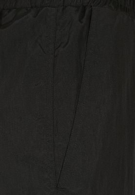 Black shimmering long pants and pirate pants lady
