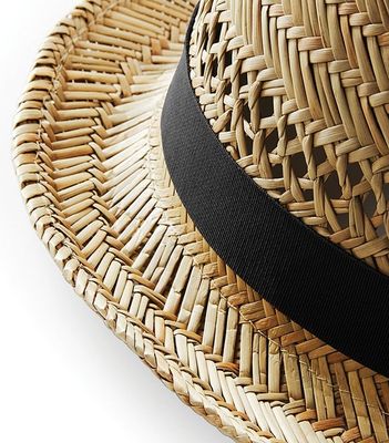Straw hat with black ribbon