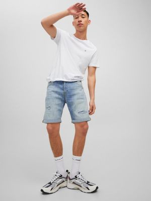 Light blue denim shorts with torns