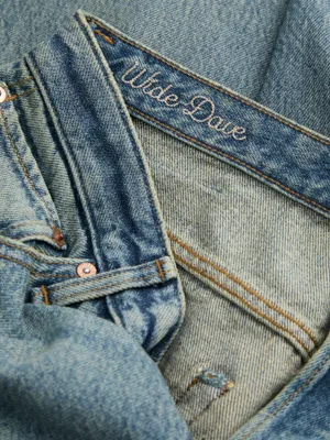 Slitna och tvättade wide fit jeans - DAVE