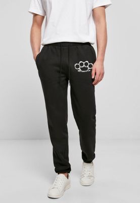 Jogging pants with brass knuckles