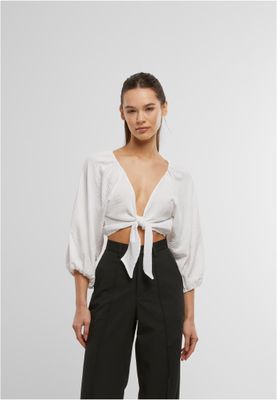 Elegant strukturerad blus med knut