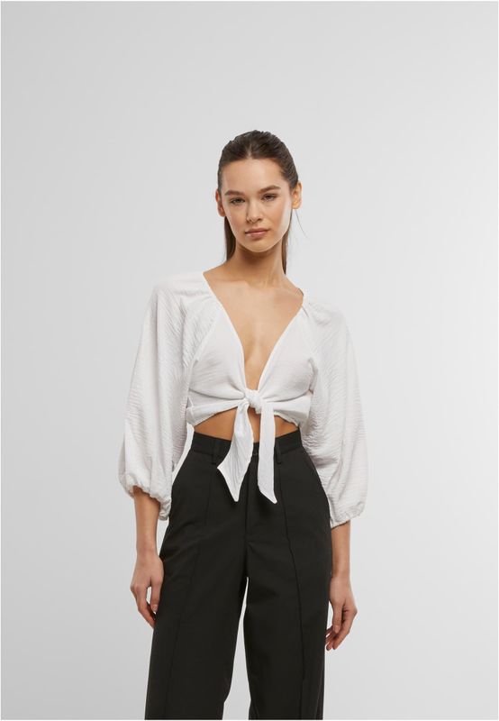 Elegant strukturerad blus med knut