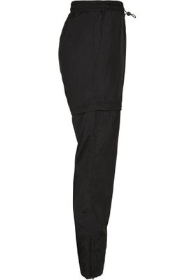 Black shimmering long pants and pirate pants lady