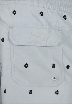 Gray swim shorts with skulls