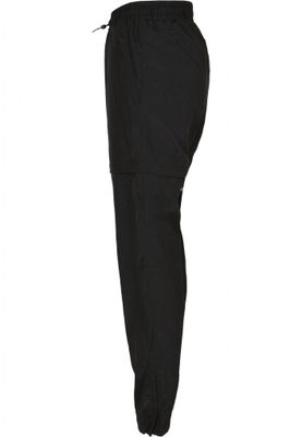 Black shimmering long pants and pirate pants lady