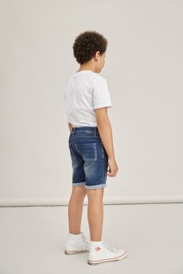 Blue denim shorts with a washed look for children
