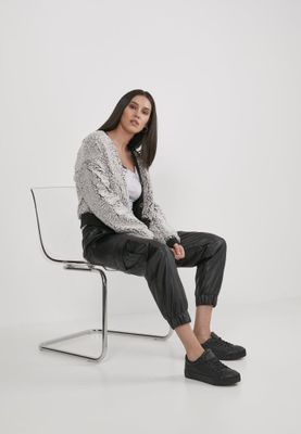Trousers with leg pocket in fake leather