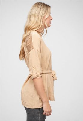 Beige tunic with tied waist