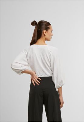 Elegant strukturerad blus med knut