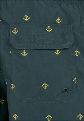 Dark green swimming shorts with golden anchors