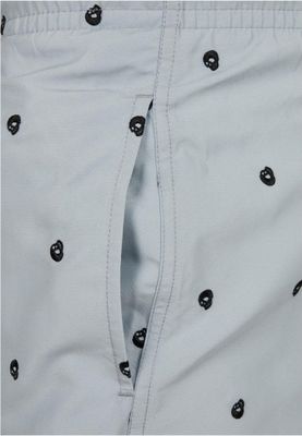 Gray swim shorts with skulls