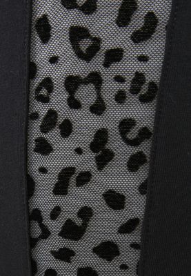 Leggings med blonder på siden