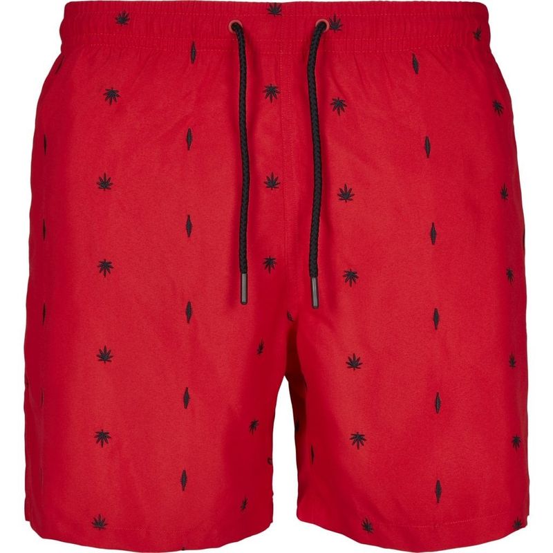 Red swim shorts with embroidered leaves