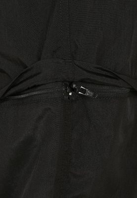 Black shimmering long pants and pirate pants lady