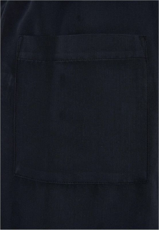 Kortärmad jumpsuit med skjortkrage