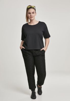Sort joggebuk med blondedame