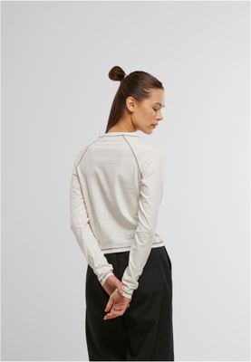 Topp för dam med kontrastdetaljer och lång ärm – offwhite