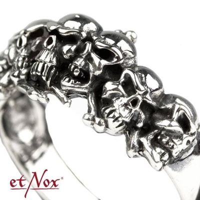 Silver ring with skulls