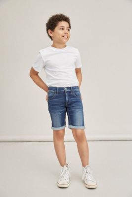 Blue denim shorts with a washed look for children